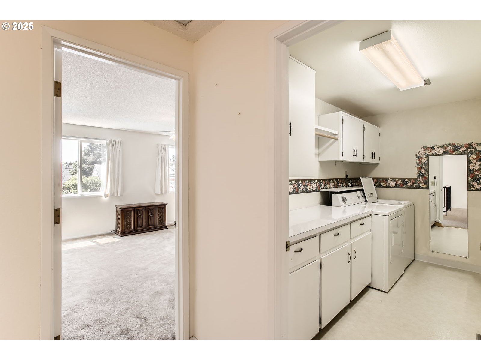 220 Northeast Village Squire Avenue, Unit 12 Gresham, OR 97030 - Photo 25 of 29 a kitchen with cabinets and window