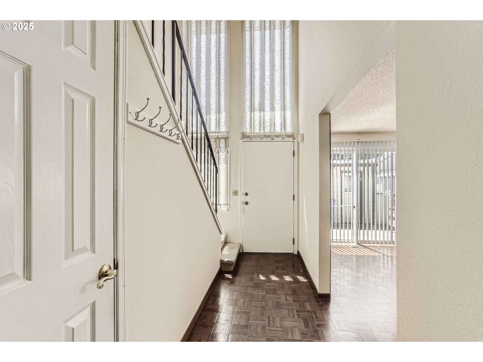 220 Northeast Village Squire Avenue, Unit 12 Gresham, OR 97030 - Photo 5 of 29 a view of wooden floor in a house