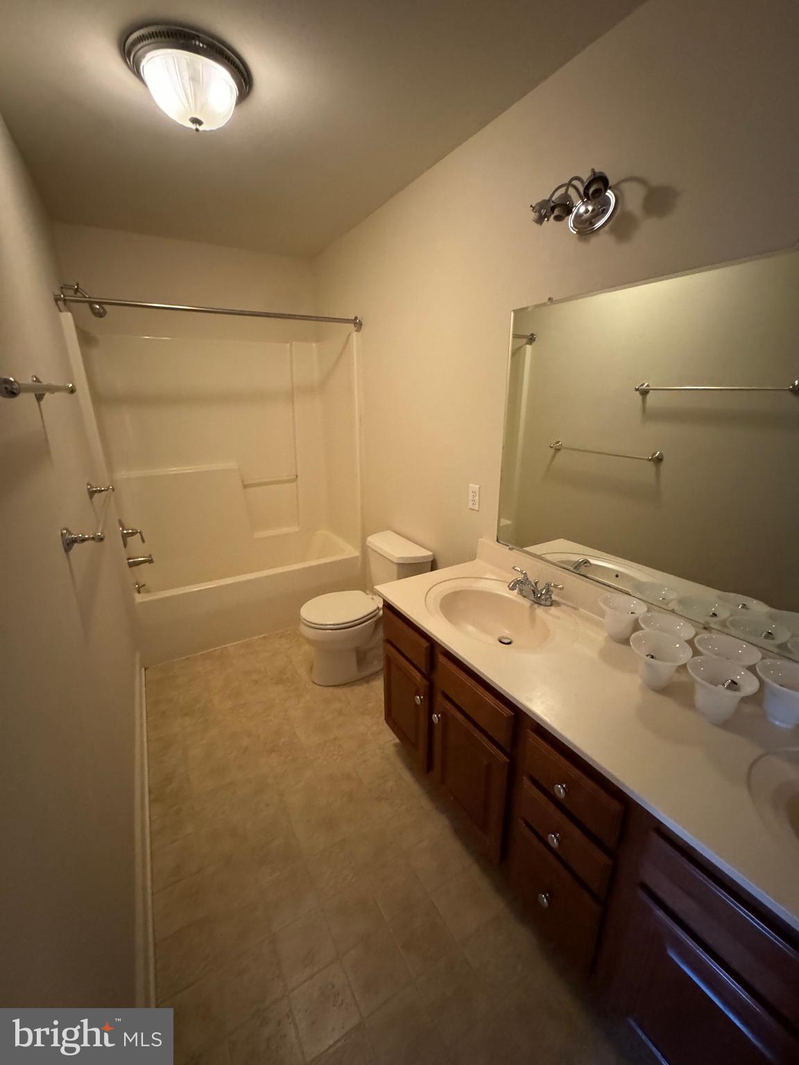 121 Scully Place Lewisberry, PA 17339 - Photo 4 of 11 a bathroom with a double vanity sink toilet and shower
