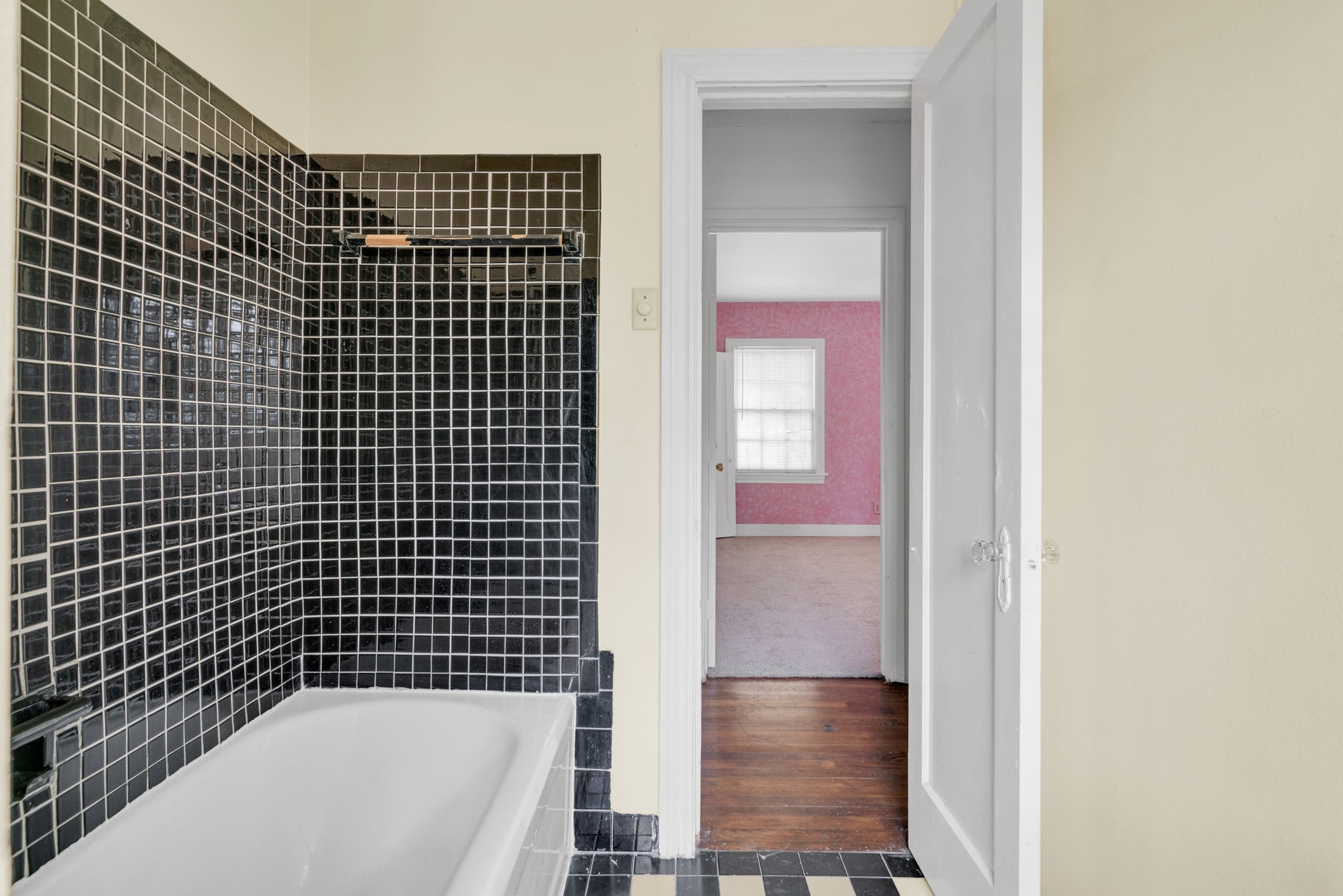 1939 Richmond Avenue, Unit 2 Houston, TX 77098 - Photo 19 of 21 a bathroom with a bathtub and shower