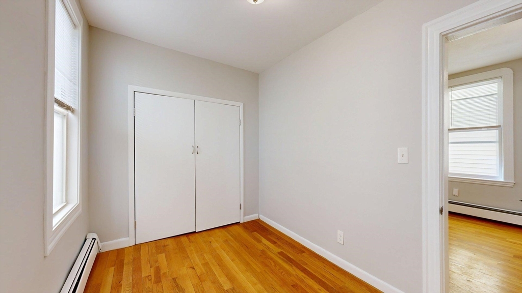 205 Chelsea Street, Unit 3 Boston, MA 02128 - Photo 11 of 33 a view of empty room with window