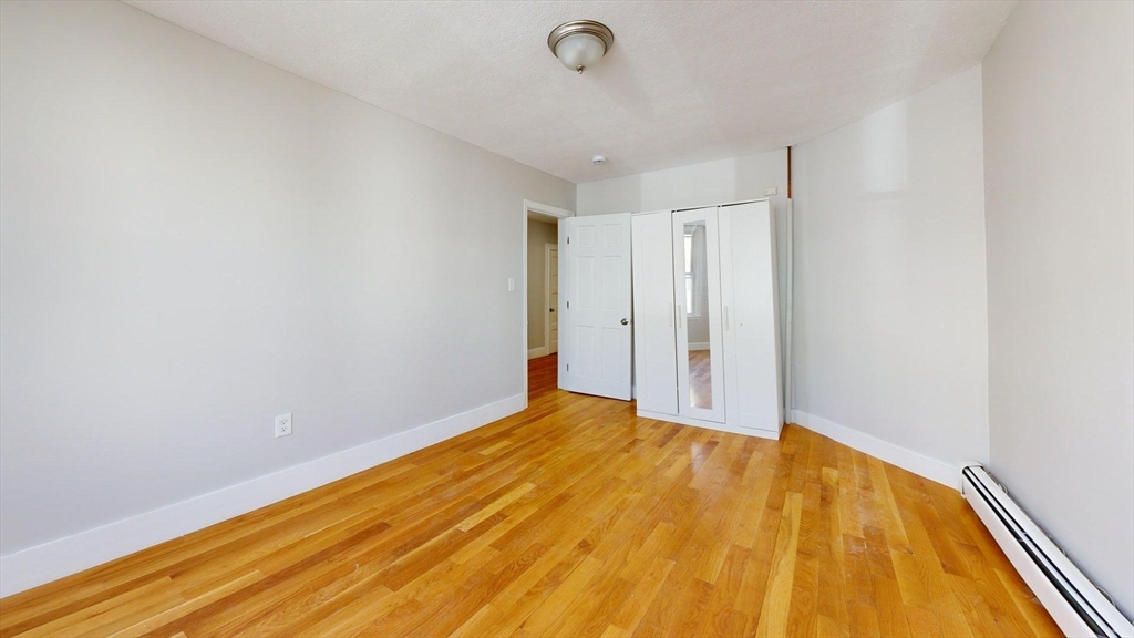 205 Chelsea Street, Unit 3 Boston, MA 02128 - Photo 19 of 33 a view of empty room