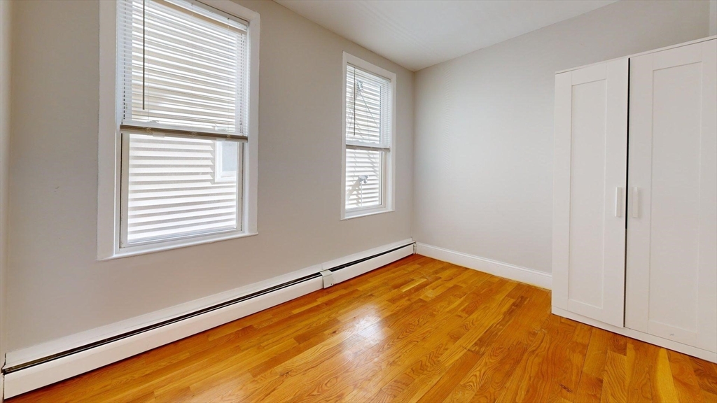 205 Chelsea Street, Unit 3 Boston, MA 02128 - Photo 23 of 33 a view of empty room with window
