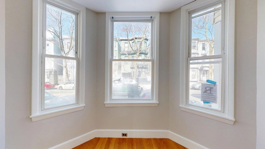 205 Chelsea Street, Unit 3 Boston, MA 02128 - Photo 6 of 33 a view of a room that has a window in it