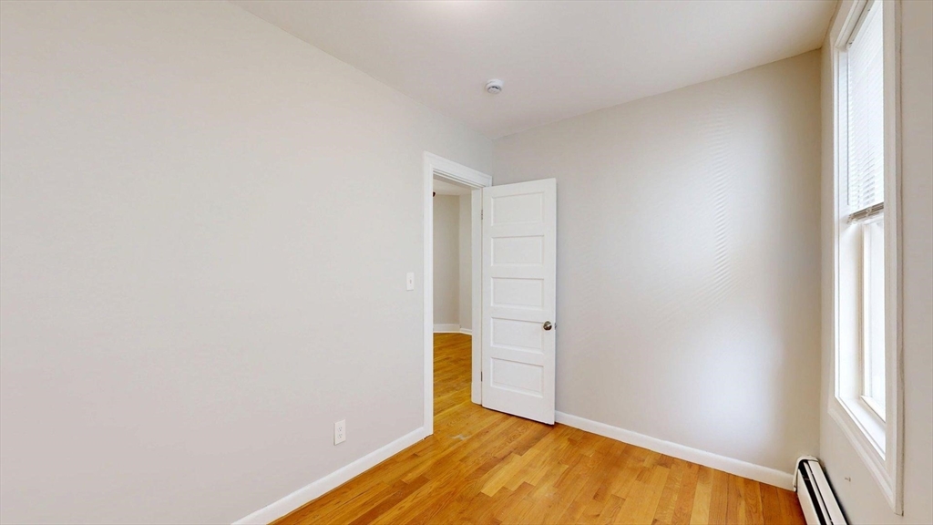 205 Chelsea Street, Unit 3 Boston, MA 02128 - Photo 10 of 33 a view of empty room