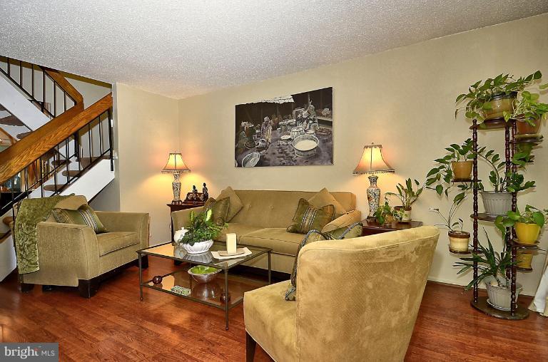 2368 Southgate Square Reston, VA 20191 - Photo 2 of 23 a living room with furniture and wooden floor