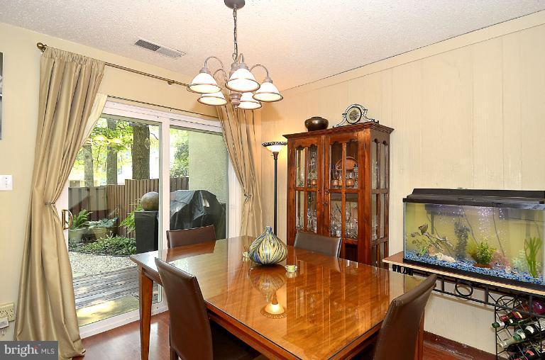 2368 Southgate Square Reston, VA 20191 - Photo 5 of 23 a view of a dining room with furniture window and outside view