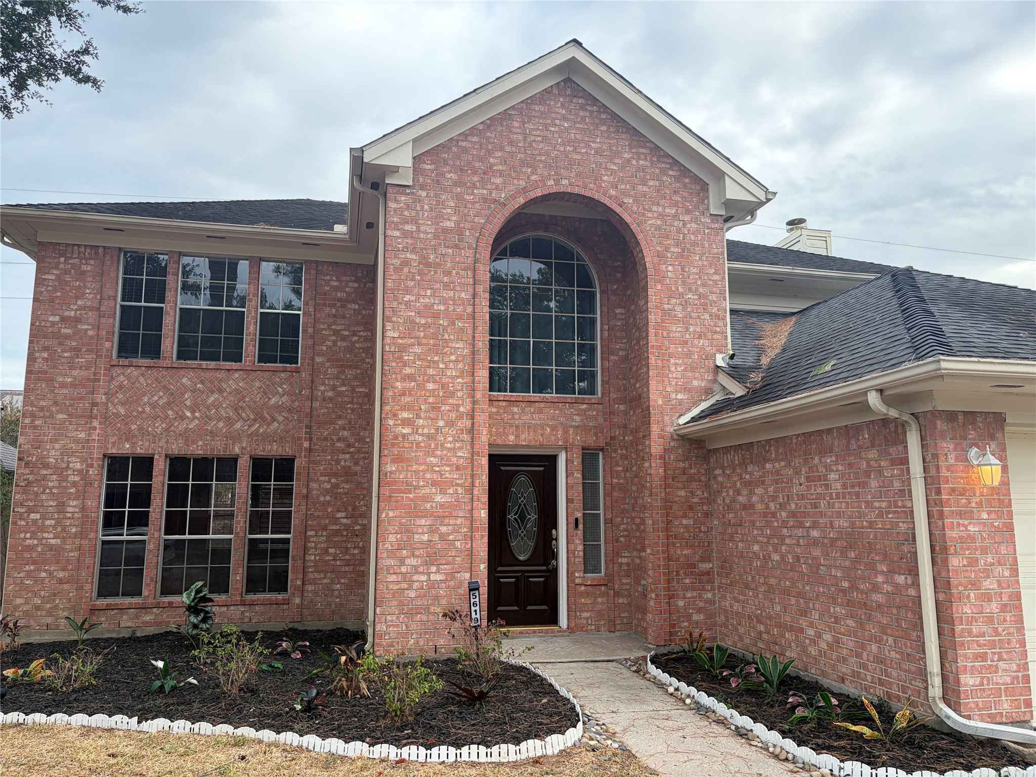 5619 Roserock Lane Spring, TX 77379 - Photo 2 of 4 Covered front porch entry