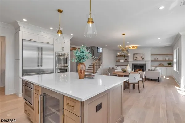 a spacious bedroom with a bed and a couch