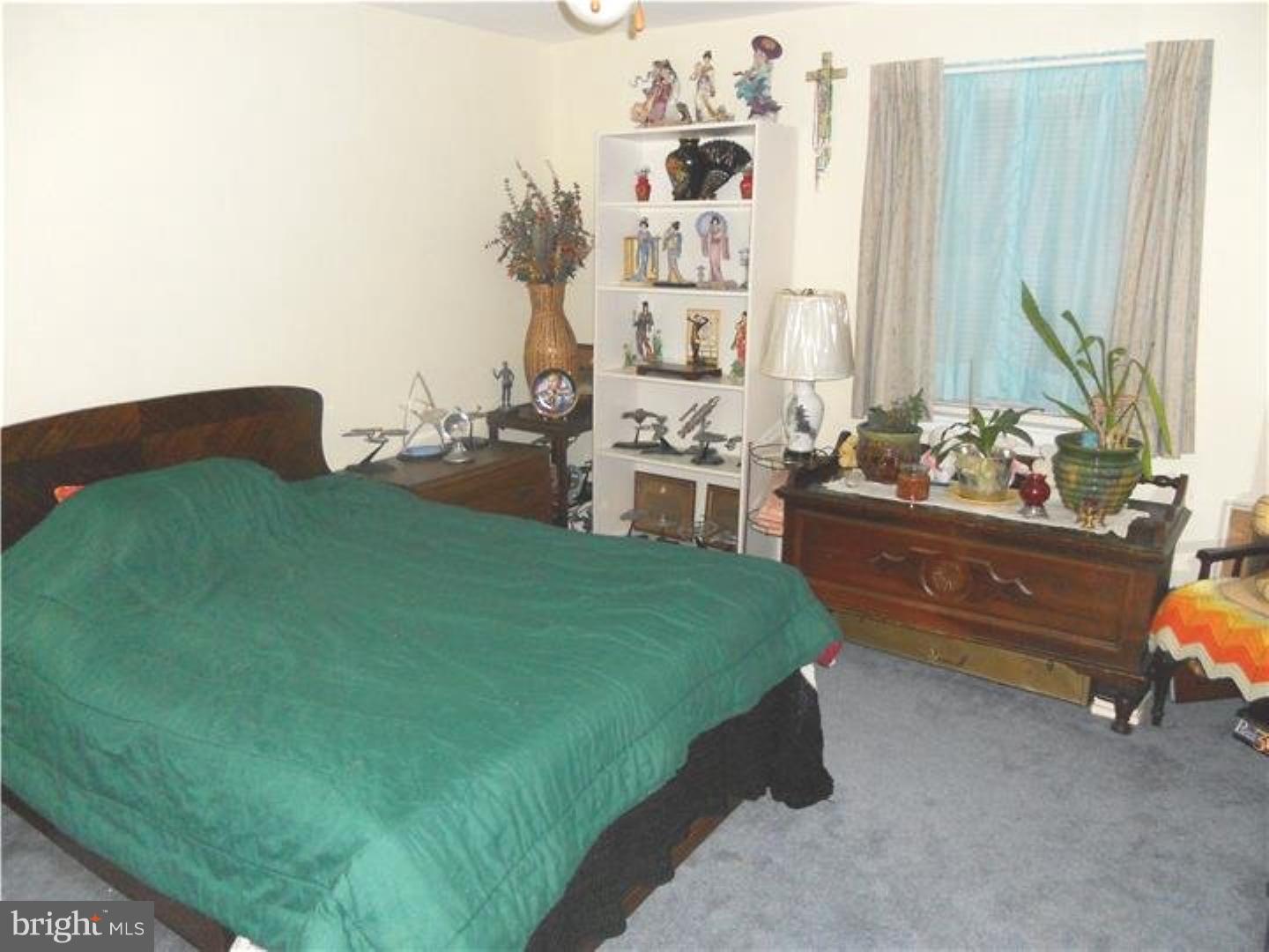 3 Radon Road Aston, PA 19014 - Photo 14 of 15 a bed room with a bed and a couch
