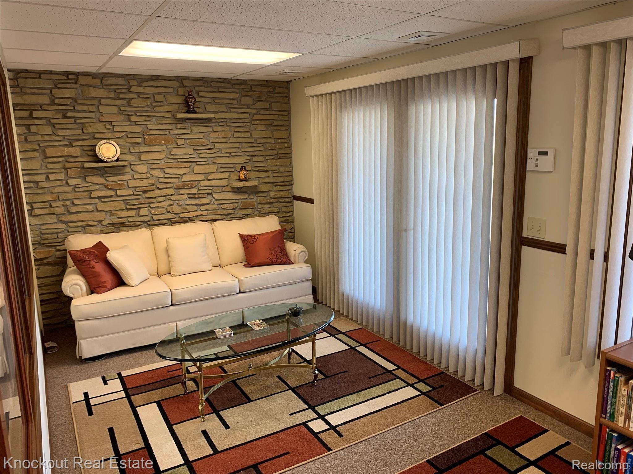 9252 Ormes Road Vassar, MI 48768 - Photo 41 of 64 Additional family room with walkout access to riverfront
