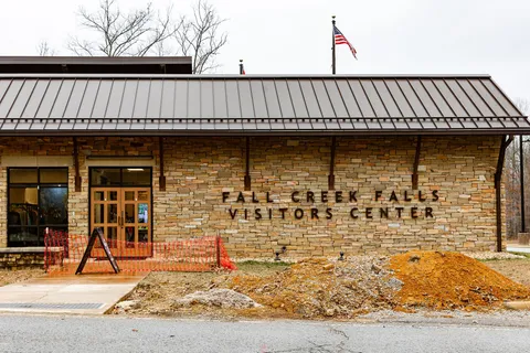 a view of a swimming pool with a lounge chair