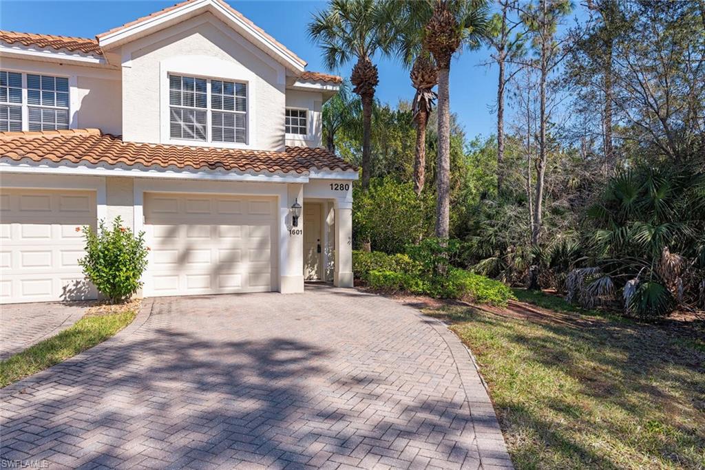 1280 Henley Street, Unit 1601 Naples, FL 34105 - Photo 1 of 15 Mediterranean / spanish-style home with a garage