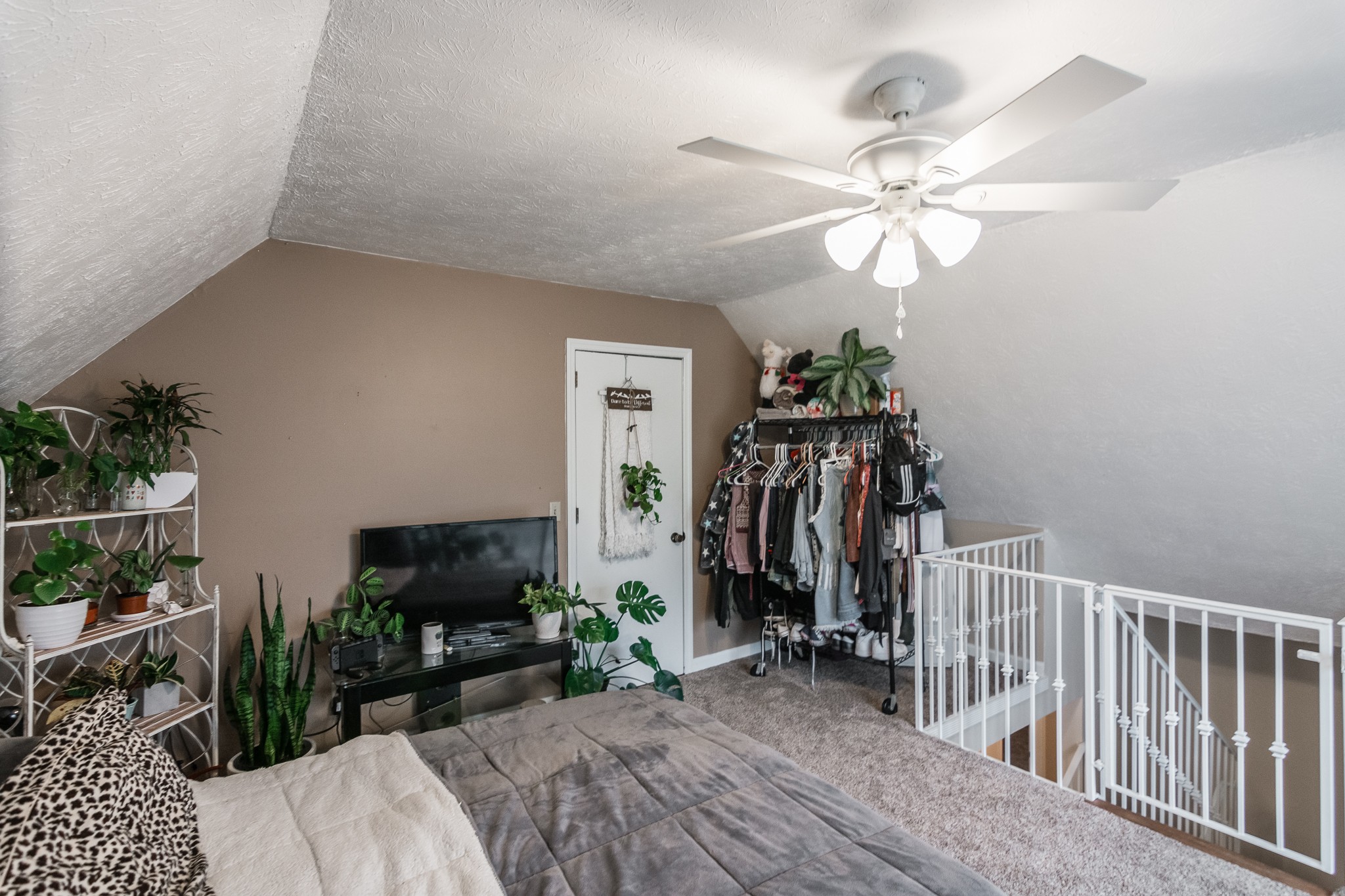 1005 Edgewater Circle Gallatin, TN 37066 - Photo 24 of 50 a view of a livingroom with furniture and a ceiling fan