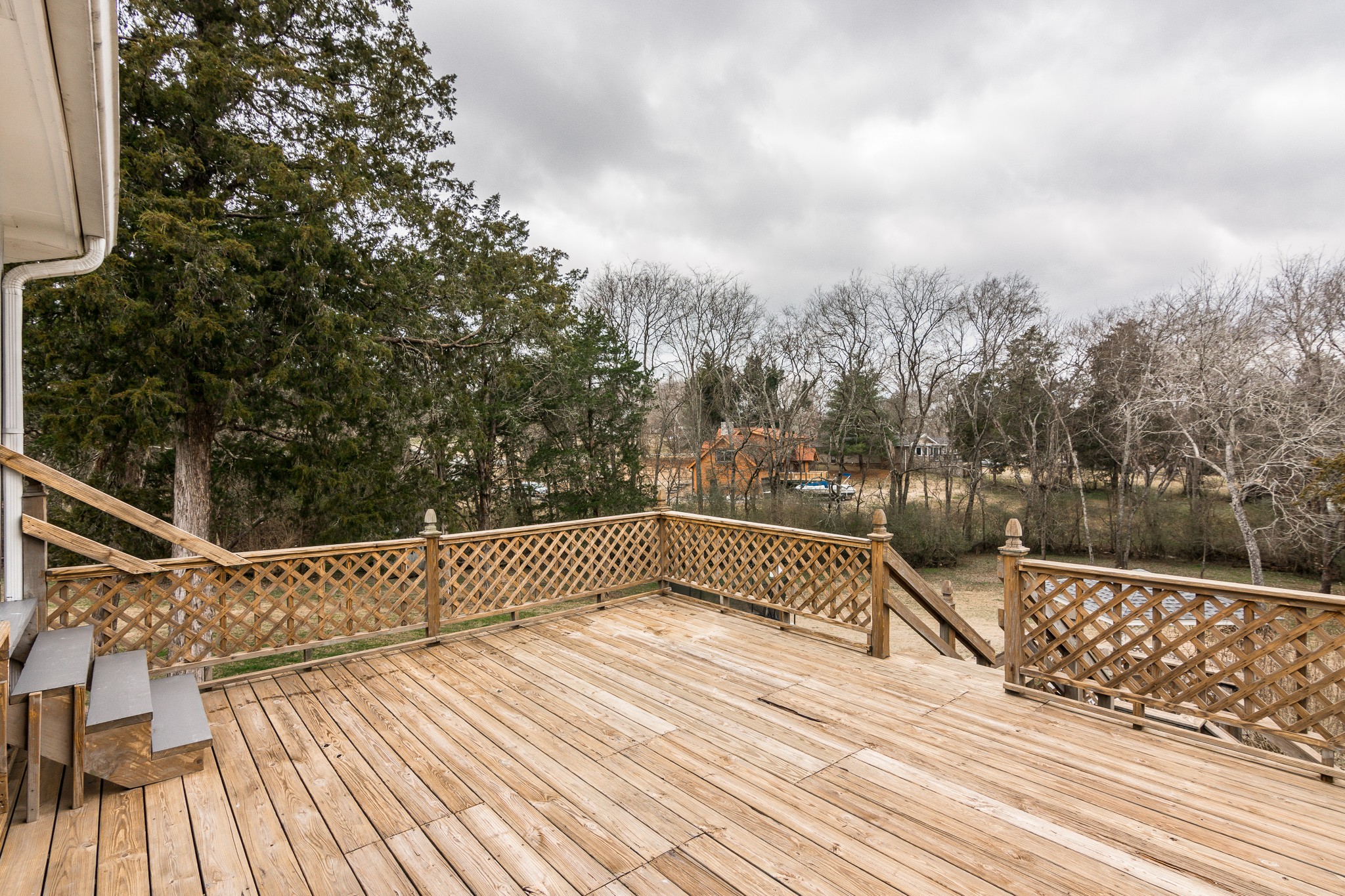 1005 Edgewater Circle Gallatin, TN 37066 - Photo 37 of 50 a view of balcony with wooden floor and fence