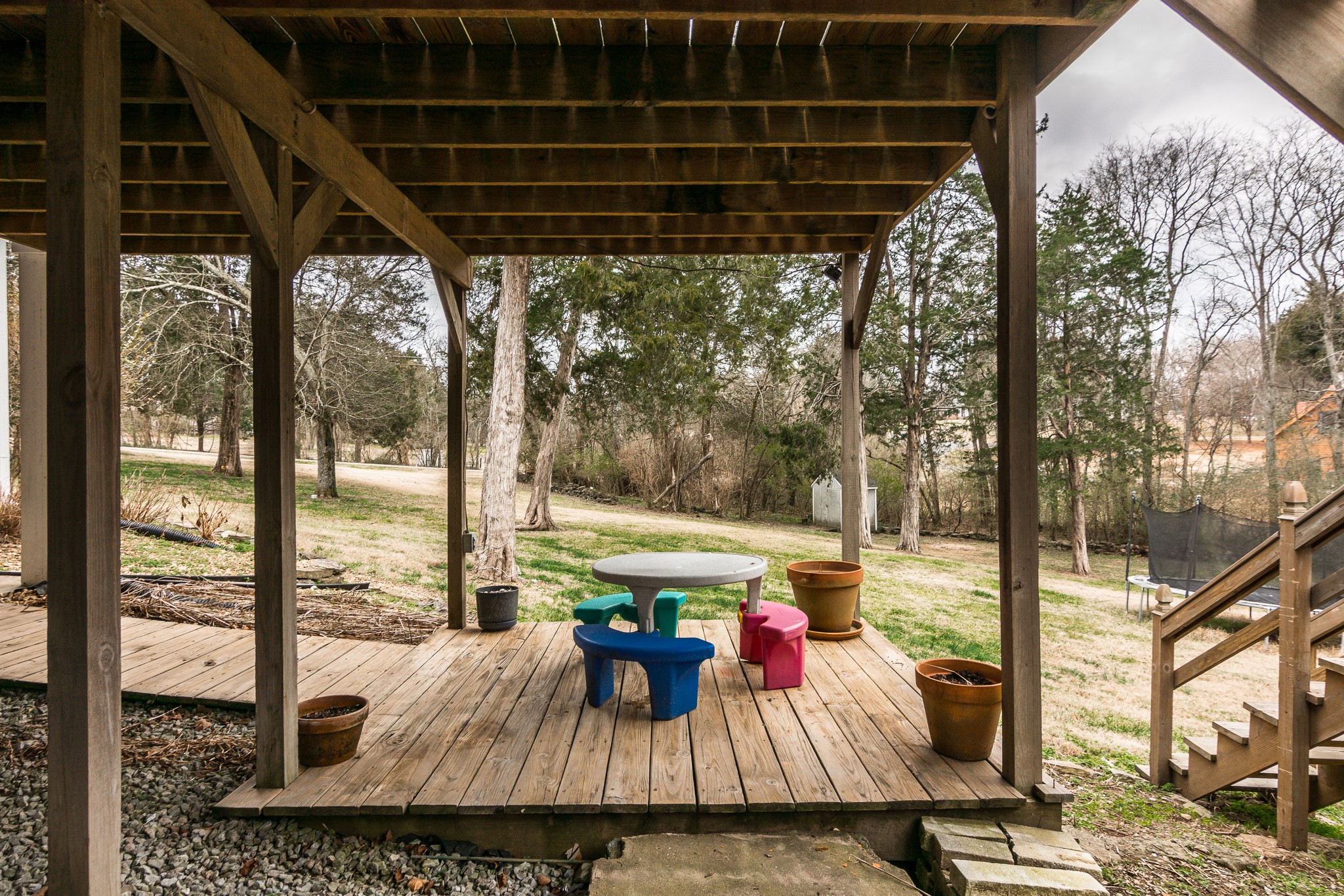 1005 Edgewater Circle Gallatin, TN 37066 - Photo 39 of 50 a view of a balcony with couch and wooden floor