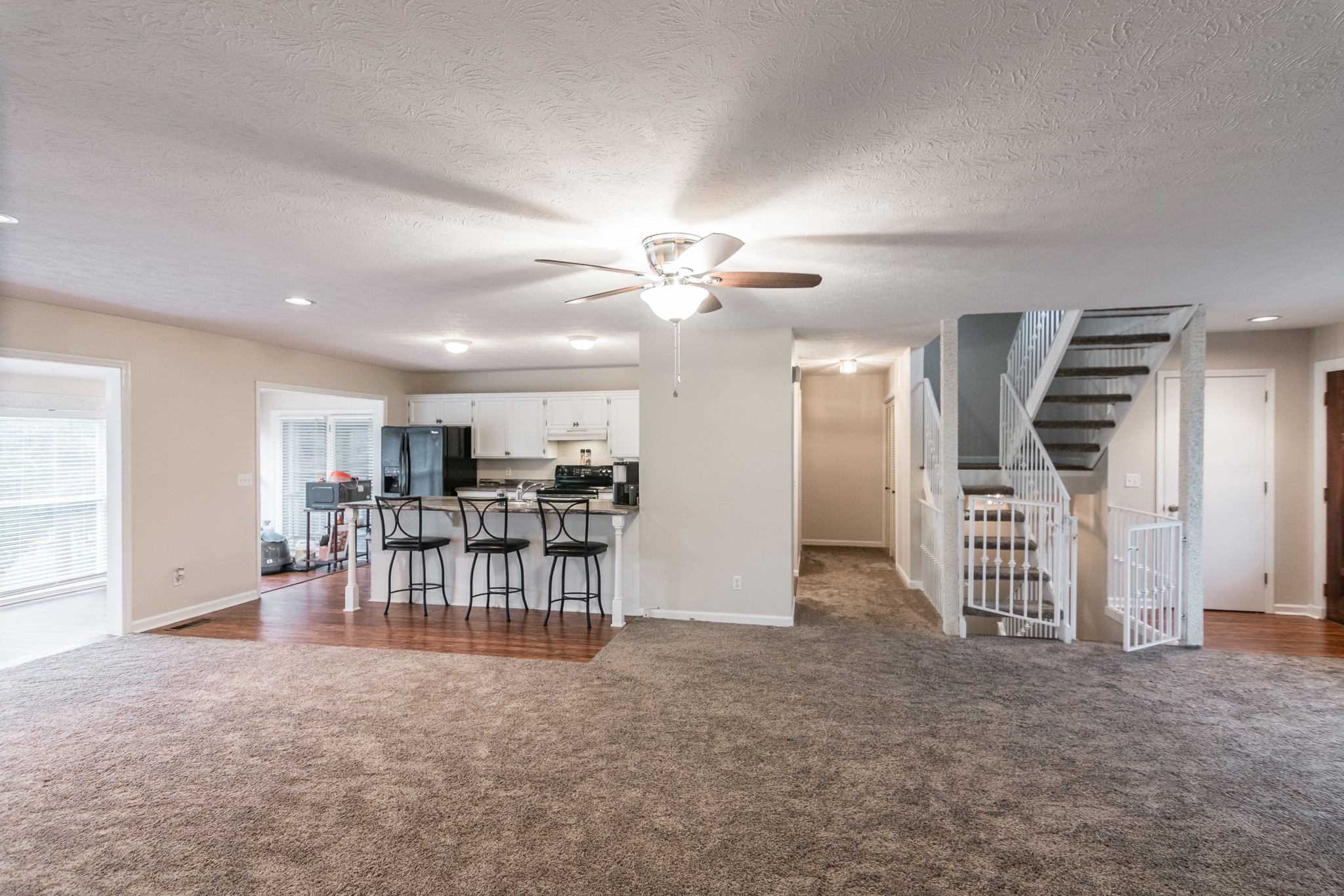 1005 Edgewater Circle Gallatin, TN 37066 - Photo 7 of 50 a view of a livingroom with furniture and a ceiling fan