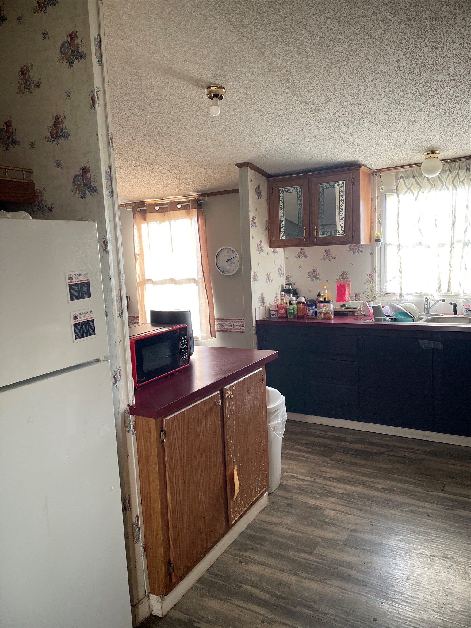 59 Wallace Road Huntsville, TX 77320 - Photo 10 of 16 a kitchen with stainless steel appliances granite countertop a sink stove and refrigerator