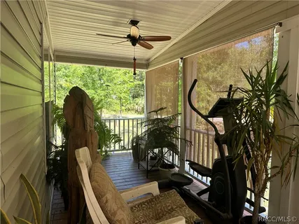 a view of a porch with furniture