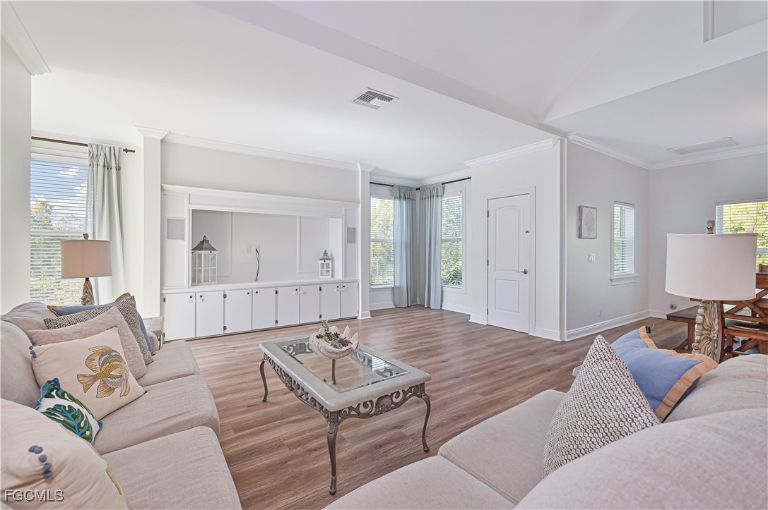 6941 Hunters Road Naples, FL 34109 - Photo 27 of 45 a living room with furniture