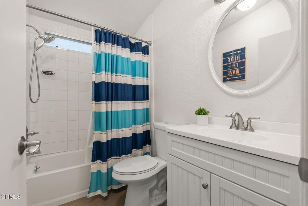 1025 Cachuma Avenue, Unit 59 Ventura, CA 93004 - Photo 16 of 36 a bathroom with a sink a toilet and shower