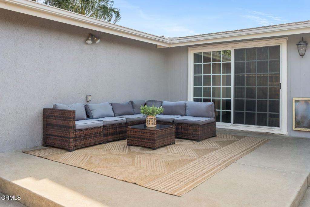 1025 Cachuma Avenue, Unit 59 Ventura, CA 93004 - Photo 18 of 36 a living room with furniture and windows
