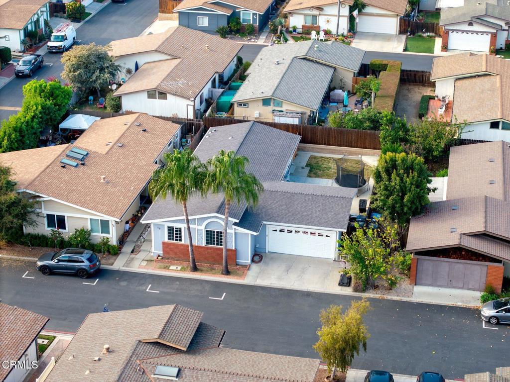 1025 Cachuma Avenue, Unit 59 Ventura, CA 93004 - Photo 19 of 36 an aerial view of multiple houses with a street