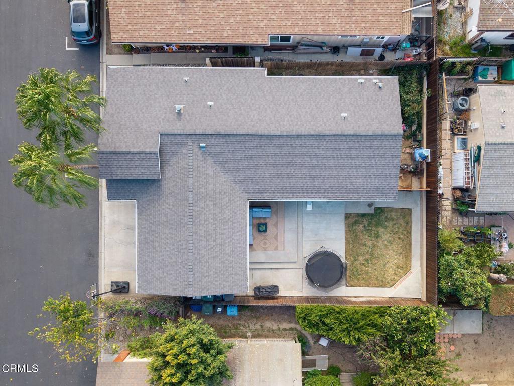 1025 Cachuma Avenue, Unit 59 Ventura, CA 93004 - Photo 20 of 36 an aerial view of a house with garden space and a fountain