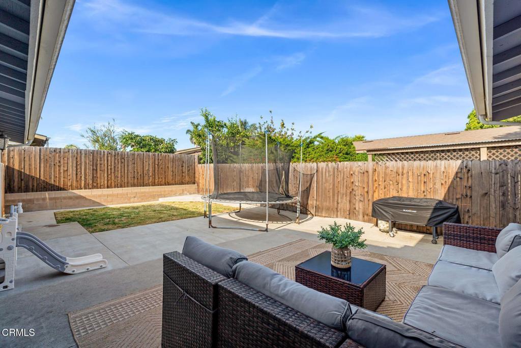 1025 Cachuma Avenue, Unit 59 Ventura, CA 93004 - Photo 2 of 36 a view of a patio with couches chairs and a fire pit