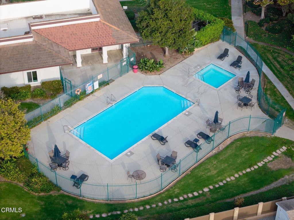 1025 Cachuma Avenue, Unit 59 Ventura, CA 93004 - Photo 27 of 36 a view of a swimming pool with a yard