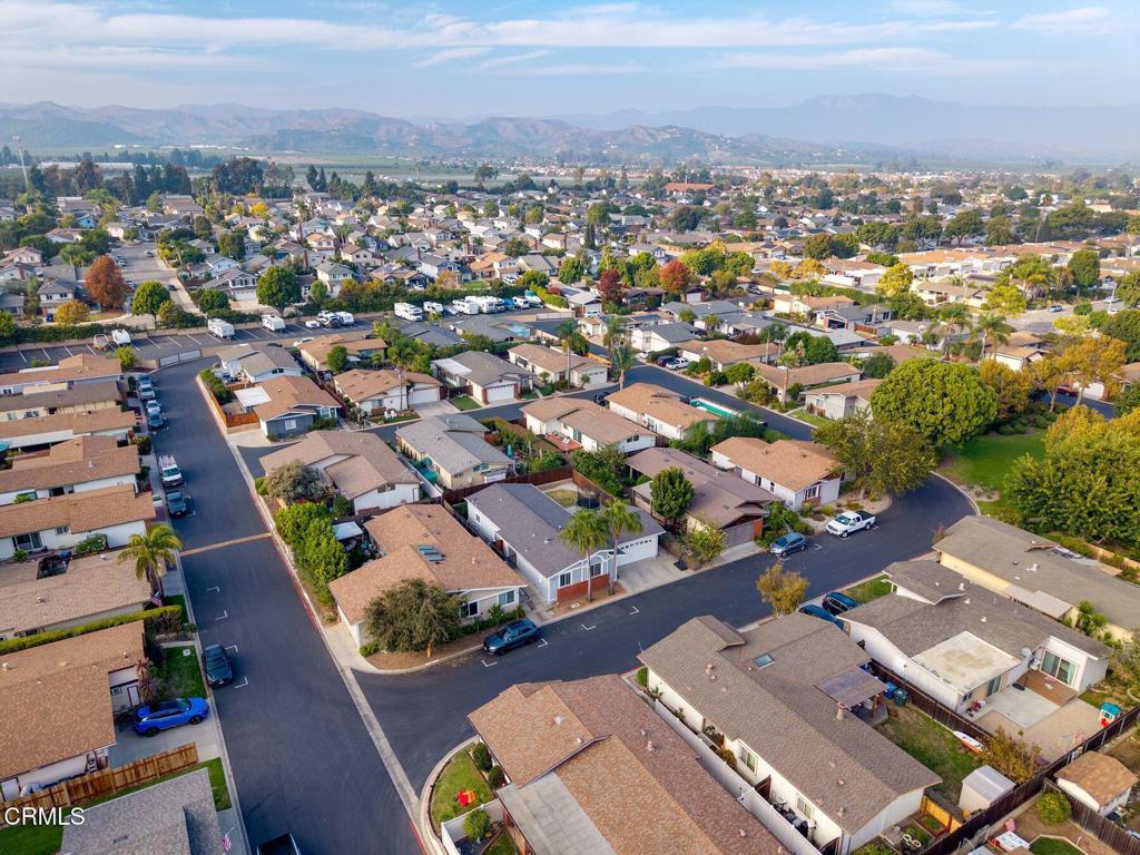 1025 Cachuma Avenue, Unit 59 Ventura, CA 93004 - Photo 32 of 36 an aerial view of residential houses with city view