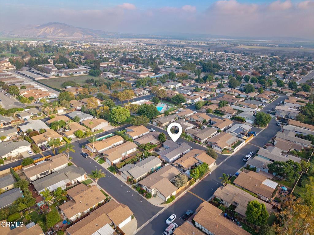 1025 Cachuma Avenue, Unit 59 Ventura, CA 93004 - Photo 34 of 36 an aerial view of a city with lots of residential buildings