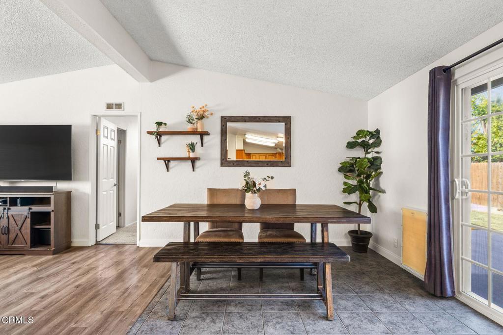 1025 Cachuma Avenue, Unit 59 Ventura, CA 93004 - Photo 5 of 36 a view of a livingroom with furniture window and wooden floor
