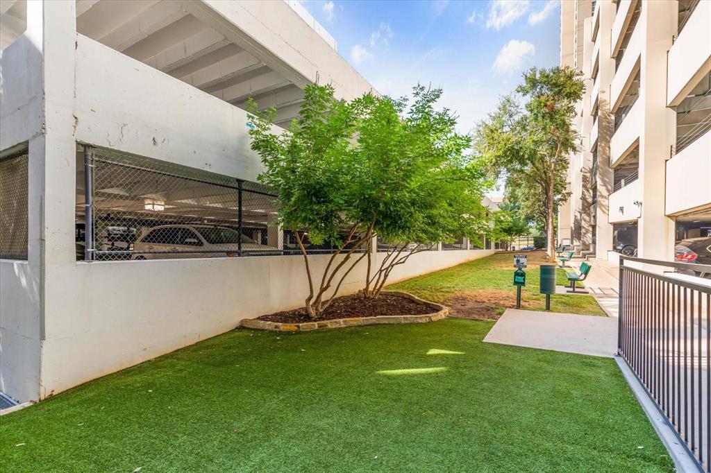 3225 Turtle Creek Boulevard, Unit 320 Dallas, TX 75219 - Photo 19 of 24 a view of a house with backyard and sitting area