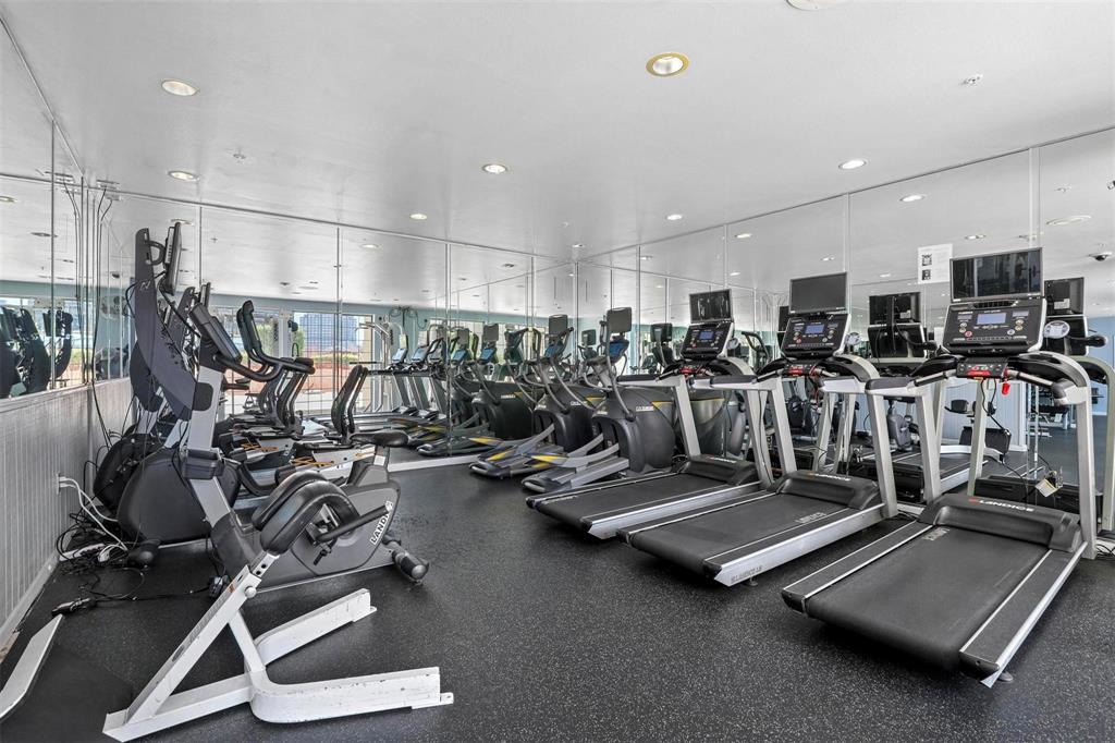3225 Turtle Creek Boulevard, Unit 320 Dallas, TX 75219 - Photo 22 of 24 a view of a room with gym equipment