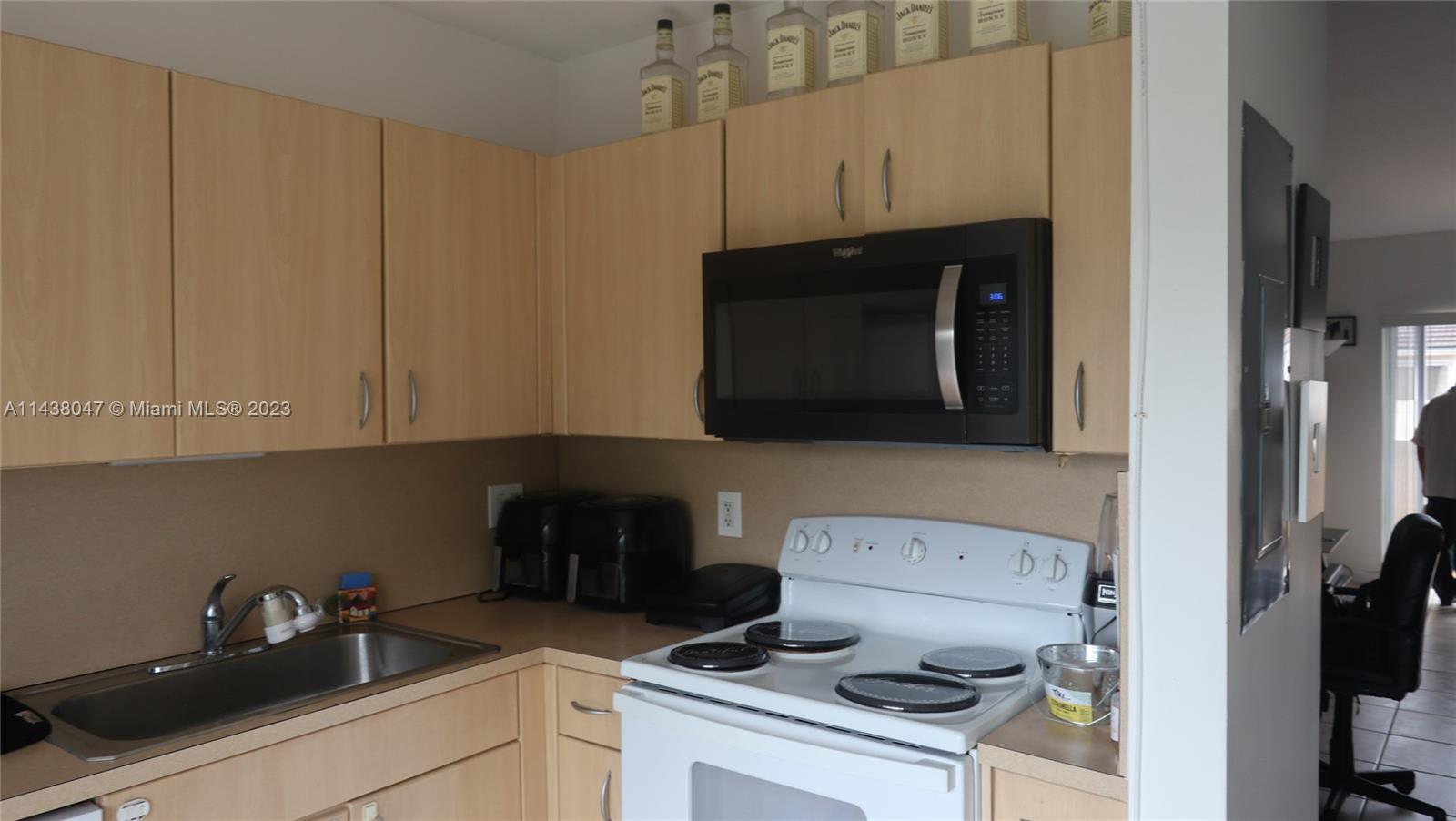 Kendall Miami, FL 33173 - Photo 7 of 9 a kitchen with a sink and cabinets