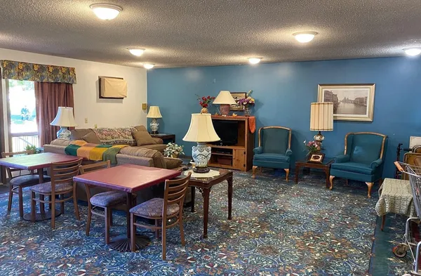 a view of a dining room with furniture