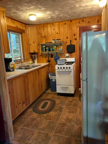 $99,900 | 95 Sandy Beach Road, Danforth, ME 04424