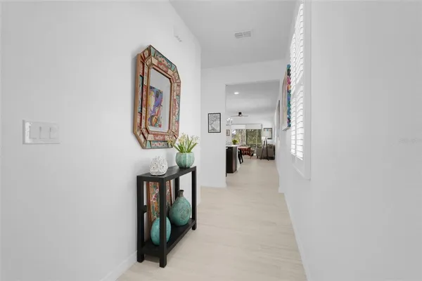 a view of hallway with livingroom