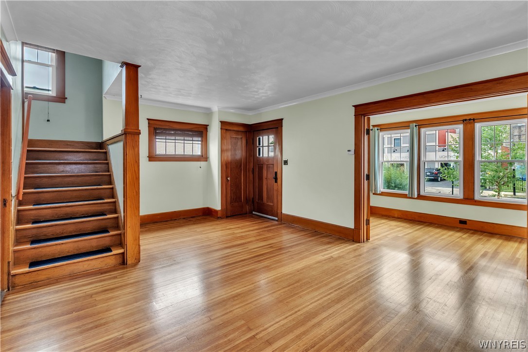 17 Westgate Road Tonawanda, NY 14217 - Photo 12 of 37 This view highlights the seamless flow to the heated sunroom when the french doors are open.