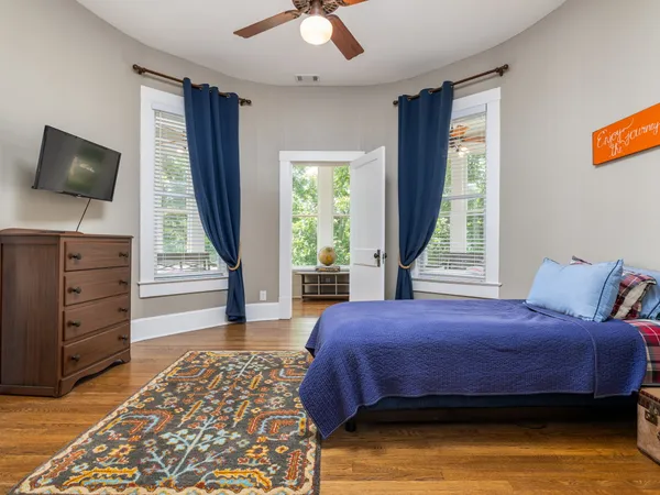 a bathroom with a sink a mirror and a shower