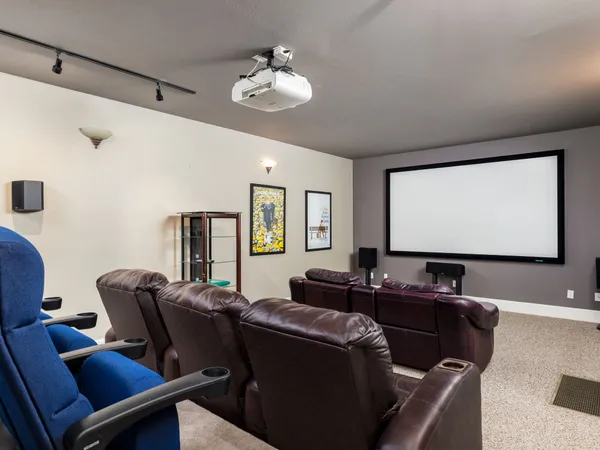 a view of an empty room with a cabinet
