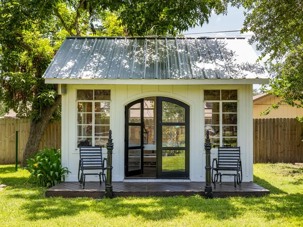 a view of swimming pool with an outdoor space and seating area