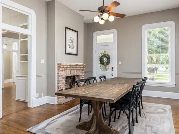 a bathroom with a granite countertop sink mirror and shower