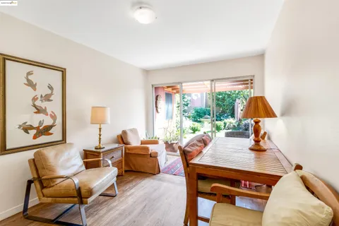 a room with furniture and wooden floor