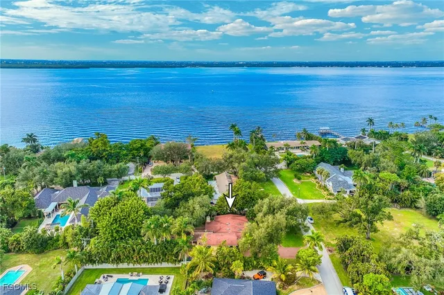 a view of a lake and a yard