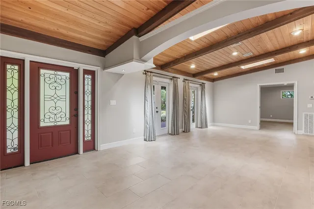 a view of empty room with front door