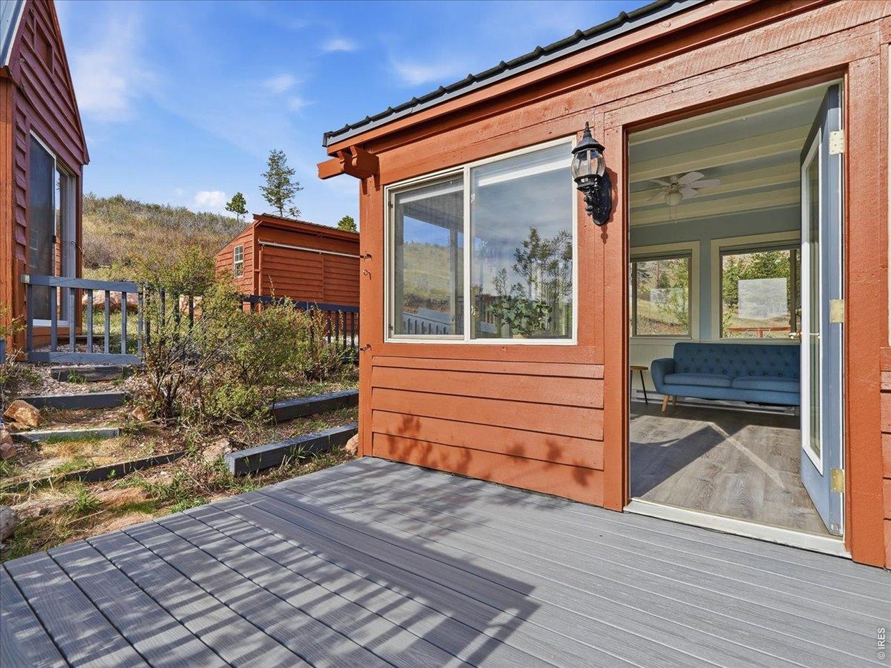 1652 Eiger Road Livermore, CO 80536 - Photo 33 of 50 Deck off the Sunroom