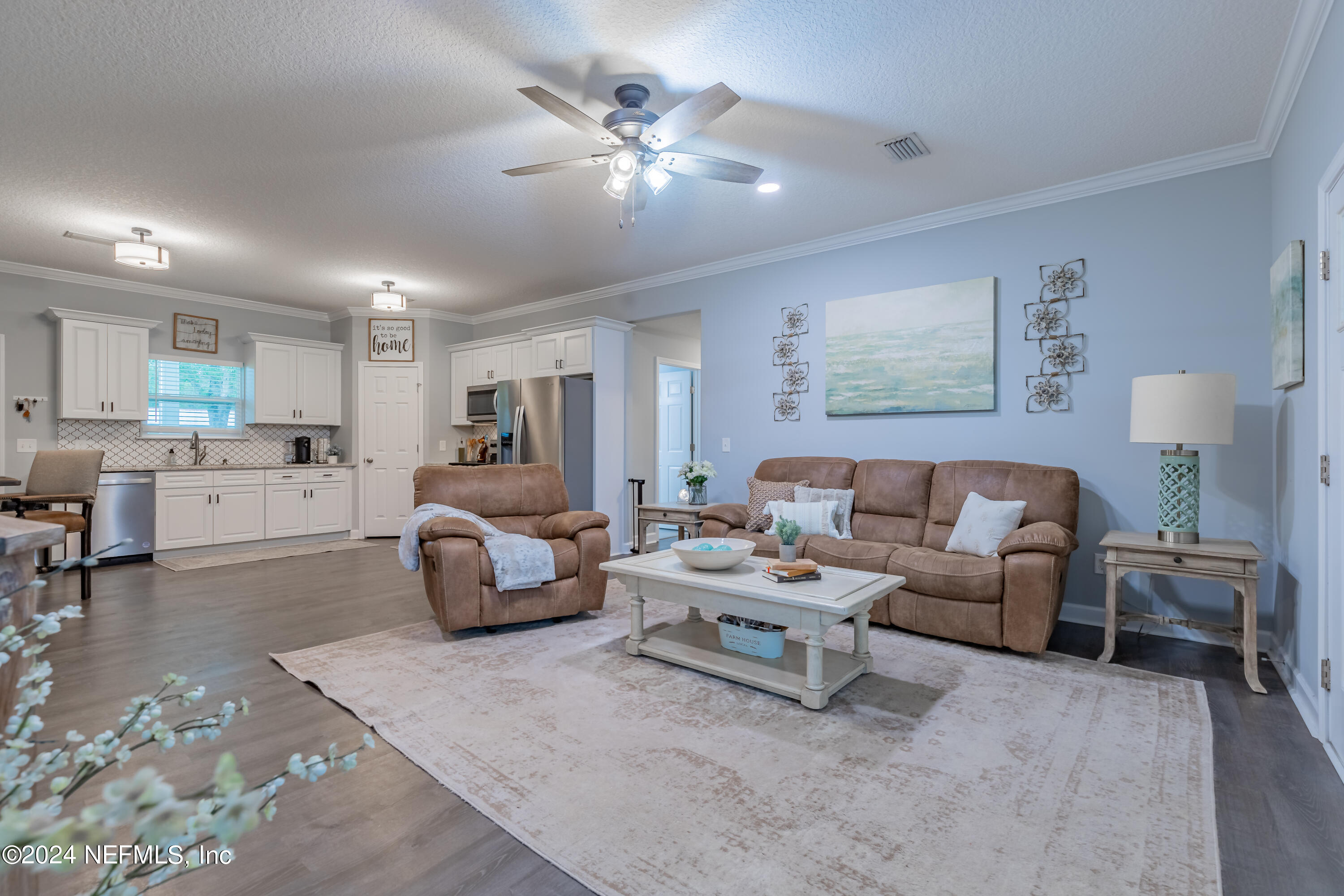 6477 Keith Griffis Circle Macclenny, FL 32063 - Photo 15 of 30 a living room with furniture and view of kitchen