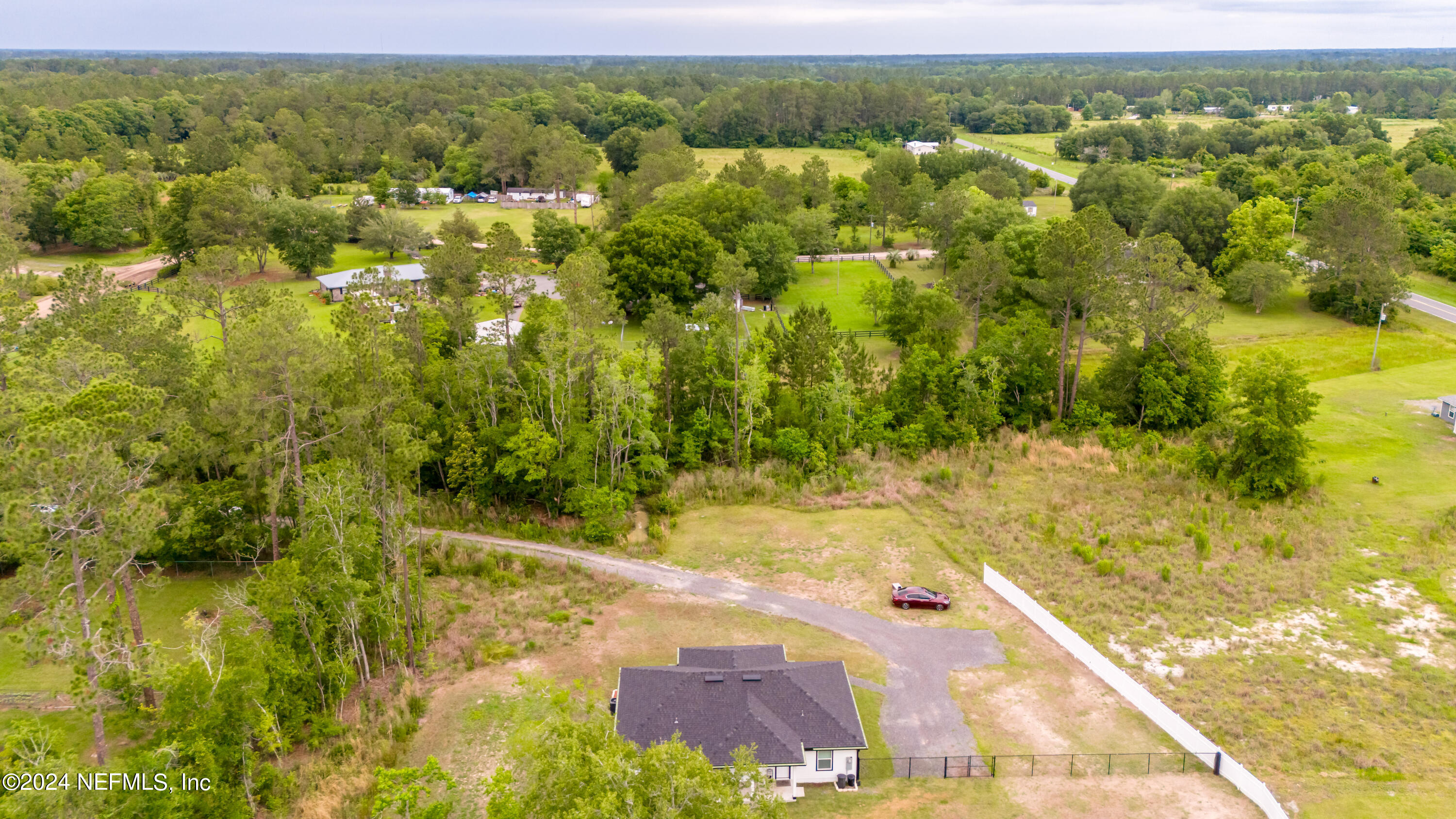 6477 Keith Griffis Circle Macclenny, FL 32063 - Photo 3 of 30 a view of a yard with an outdoor space